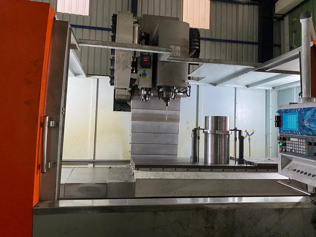 Vertical machining centre operating on a component